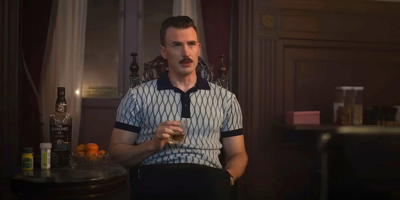 Chris Evans dans le rôle de Lloyd Hansen prend un verre dans The Grey Man