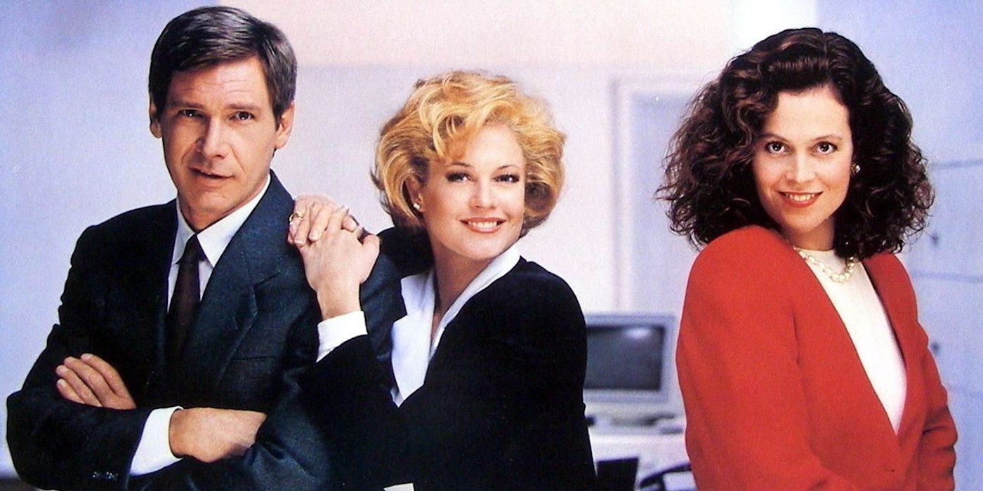 Jack (Harrison Ford), Tess (Melanie Griffith), and Katharine (Sigourney Weaver) smiling in a promotional photo for Working Girl.