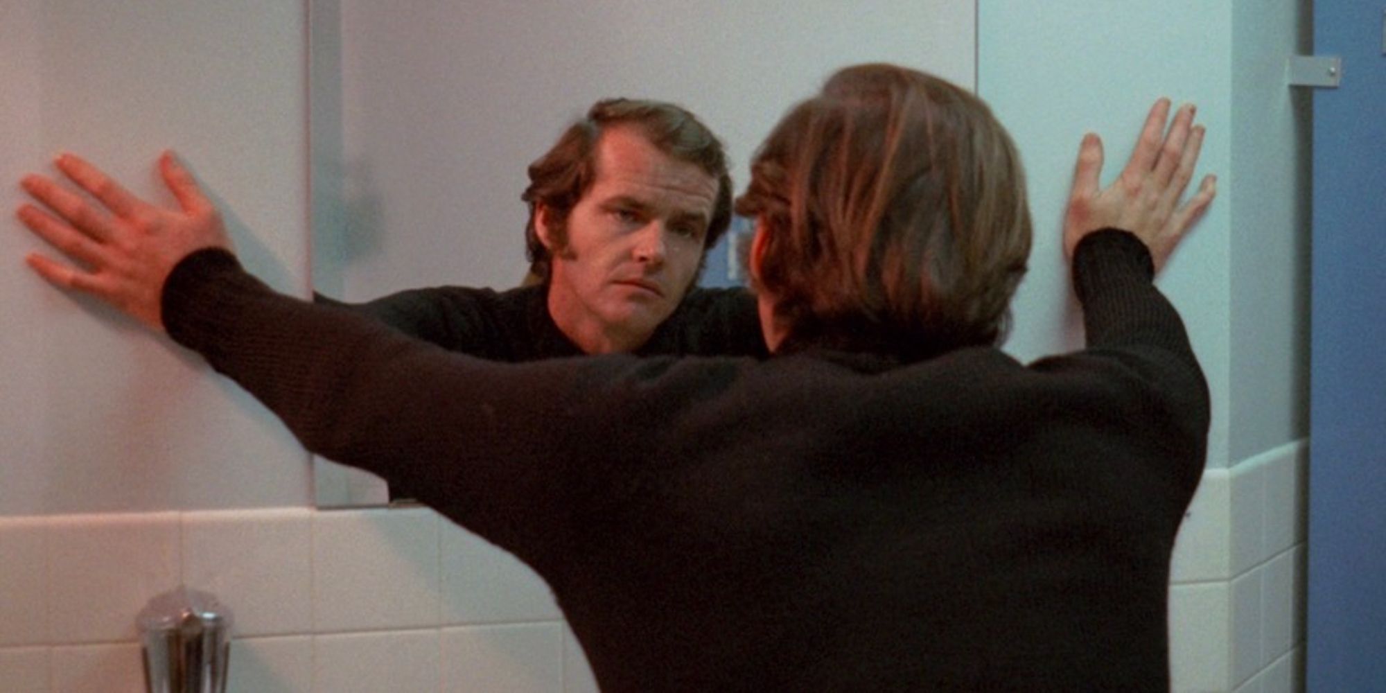 Jack Nicholson looking into a mirror in Five Easy Pieces