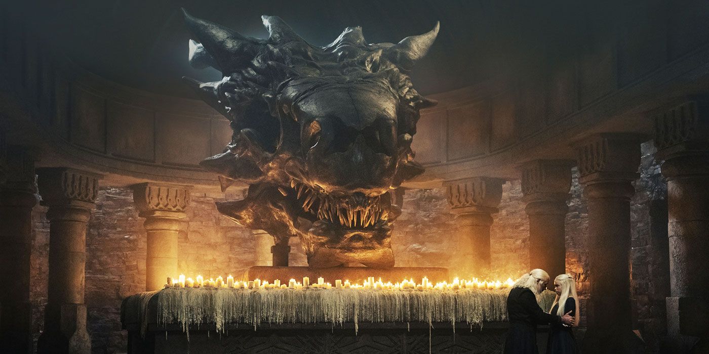 Milly Alcock and Paddy Considine in House of the Dragon Season 1 in front of a giant skull of Balerion the Black Dread