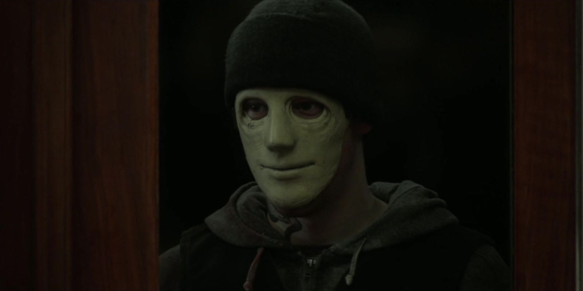 The Masked Killer standing still in "Hush"