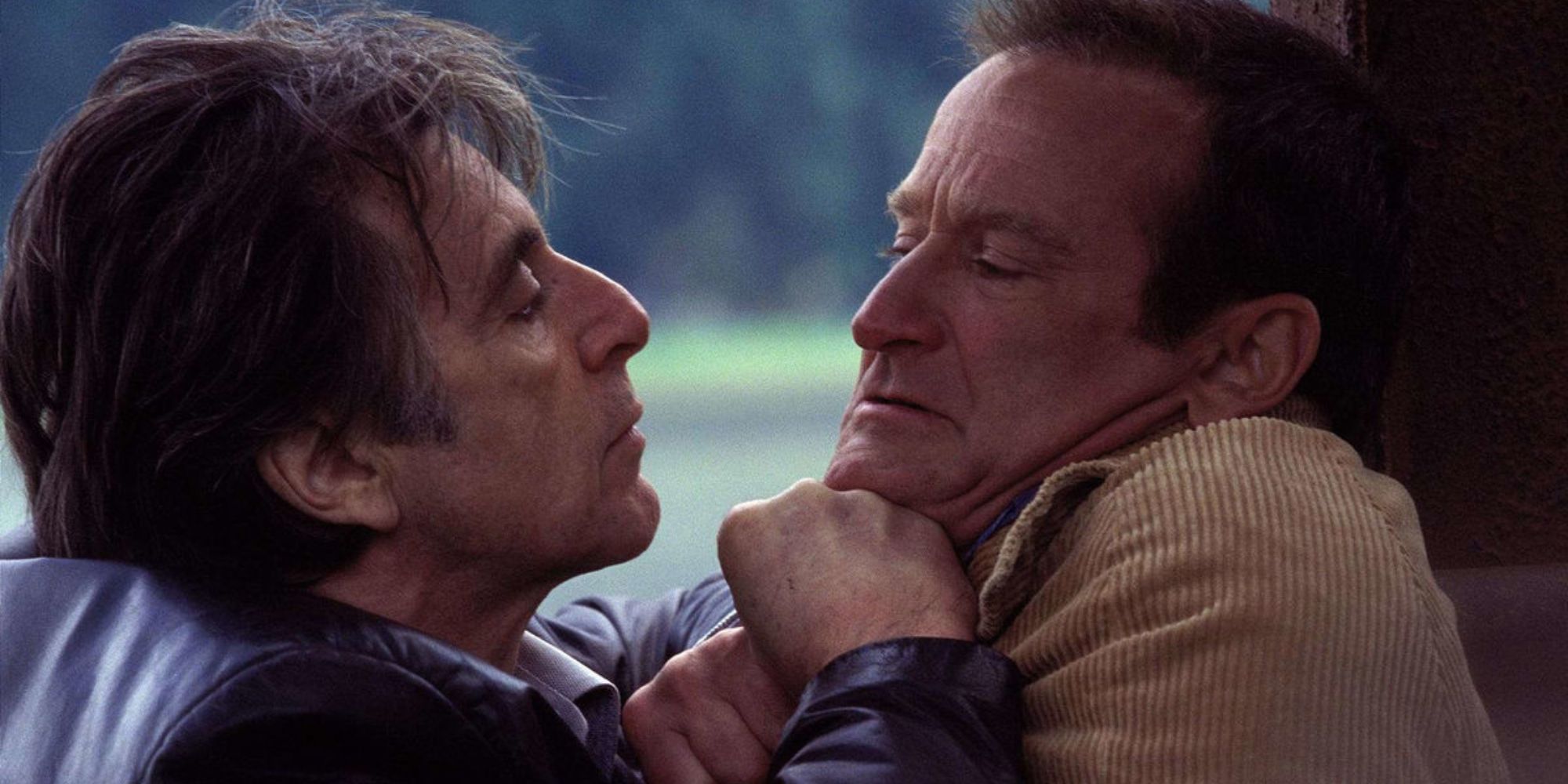 Will Dormer (Al Pacino) holding Walter Finch (Robin Williams) by the collar in Insomnia