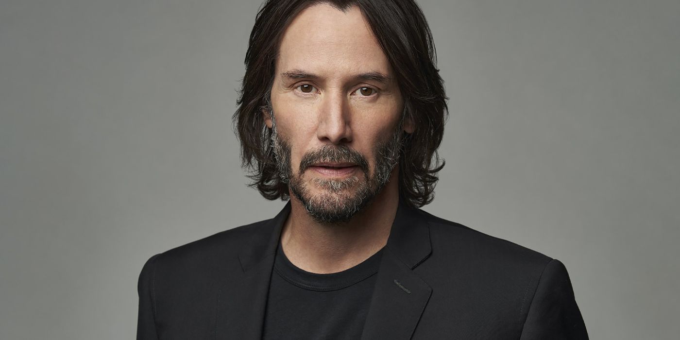 Headshot of Keanu Reeves taken by Brian Bowen Smith in front of a grey background