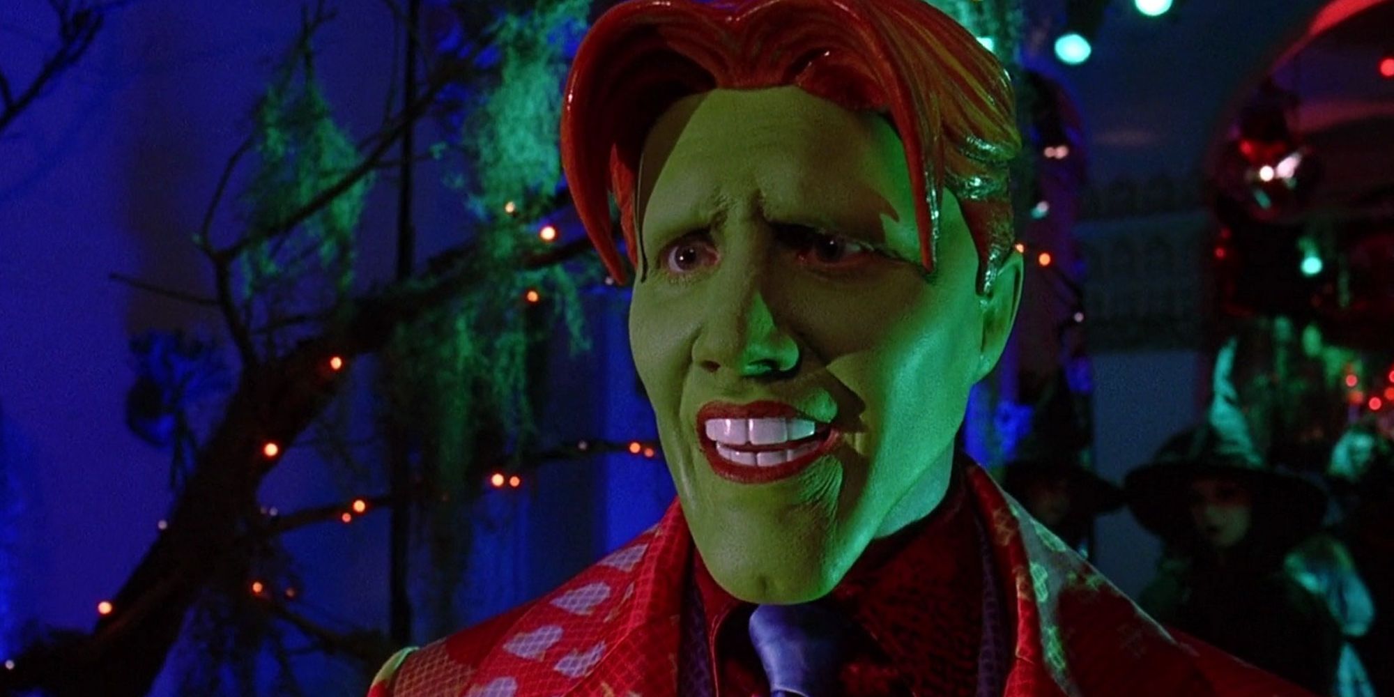 A character with green skin and large teeth has an odd expression on their face in Son of the Mask.