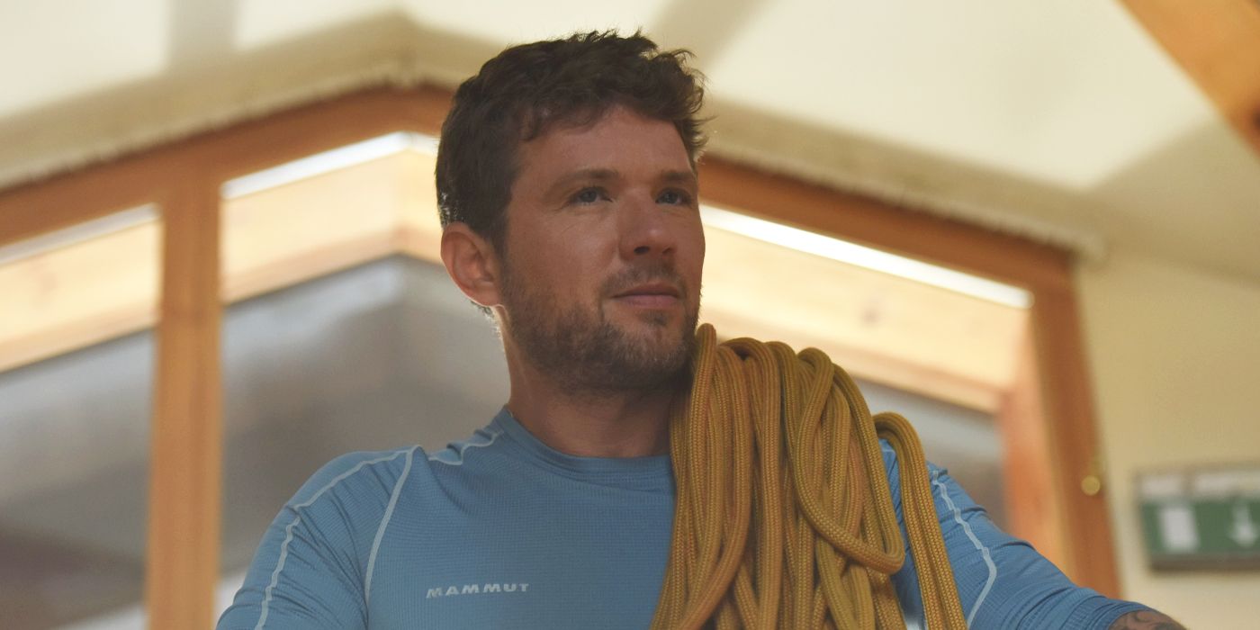 Ryan Phillippe with rope thrown over his shoulder in Summit Fever