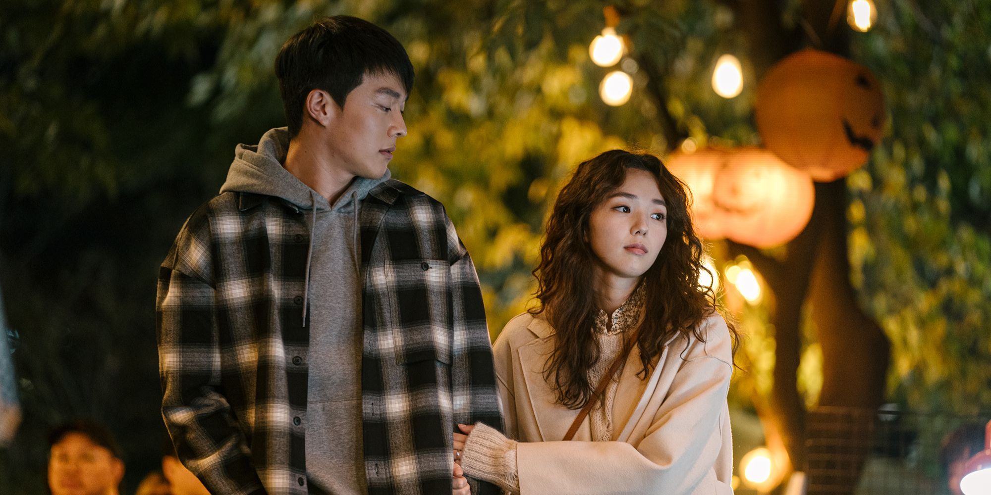 A still of a couple walking in the street from the movie Sweet and Sour