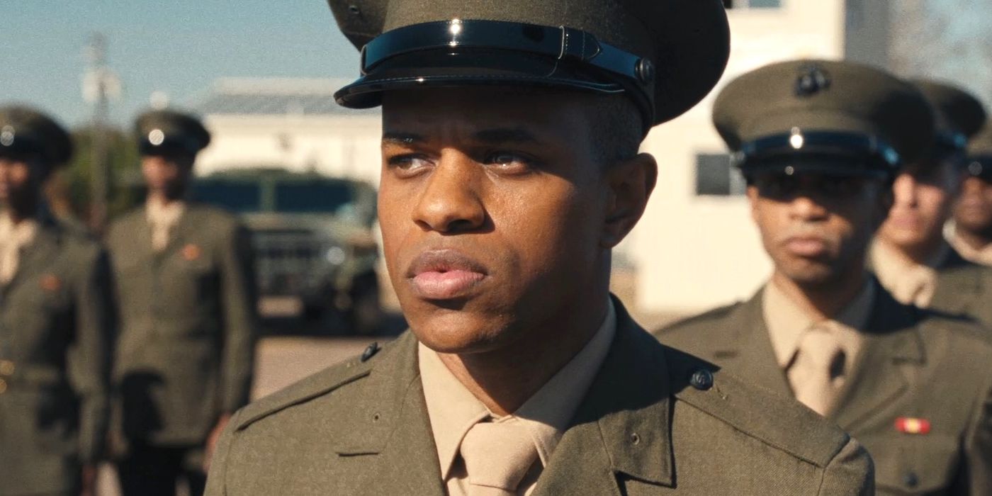 A soldier stands in line and looks straight ahead in The Inspection.