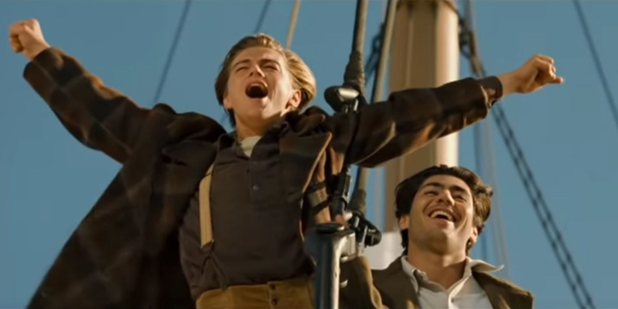 Jack Dawson and his Italian friend shout towards the sea on the bow of the Titanic