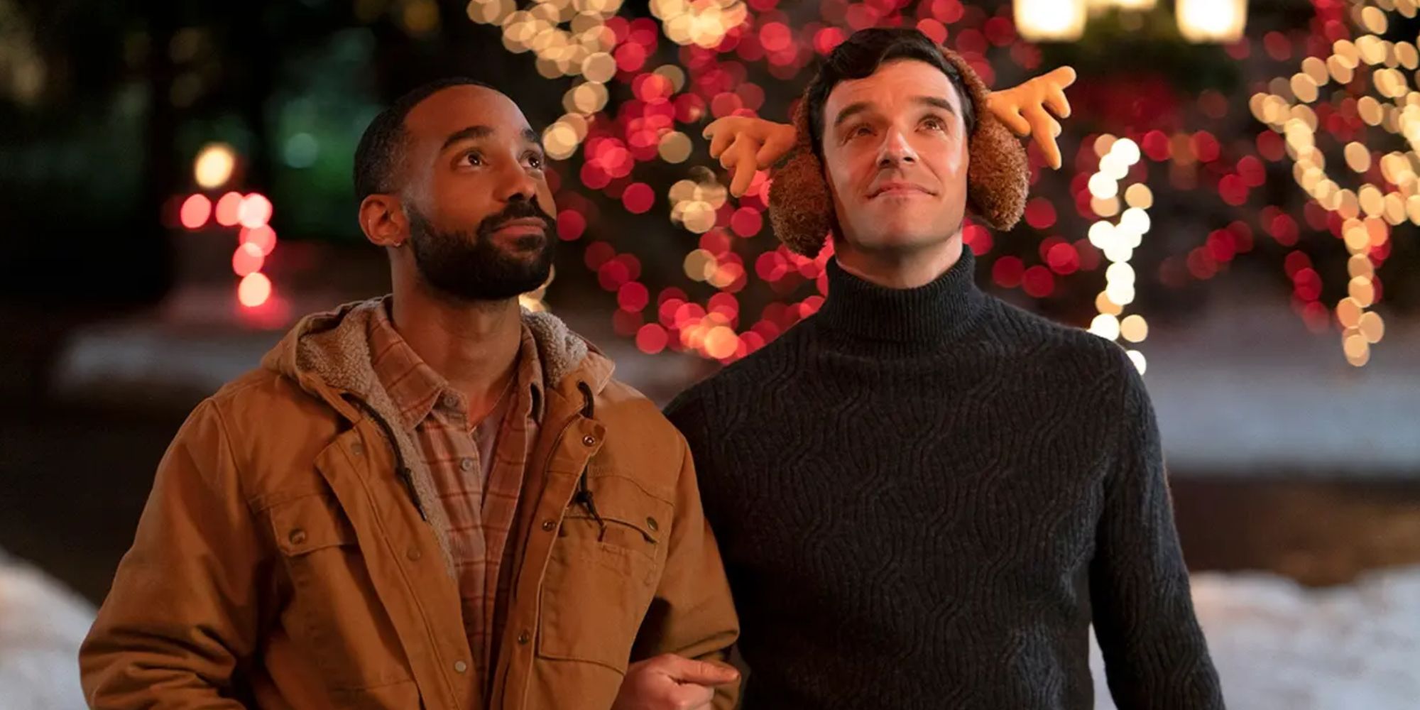 Philemon Chambers and Michael Urie as Nick and Peter looking up with looks of awe in Single All the Way