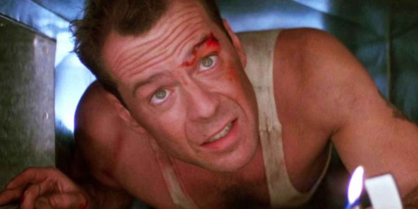 John McClane (Bruce Willis) crawls through the vents to escape detection in 'Die Hard'