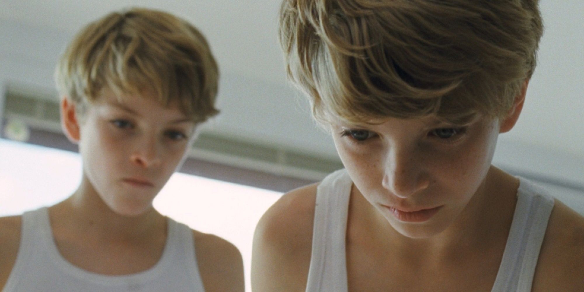 Elias and Lukas looking on with anger in their faces in &lsquo;Goodnight Mommy.'