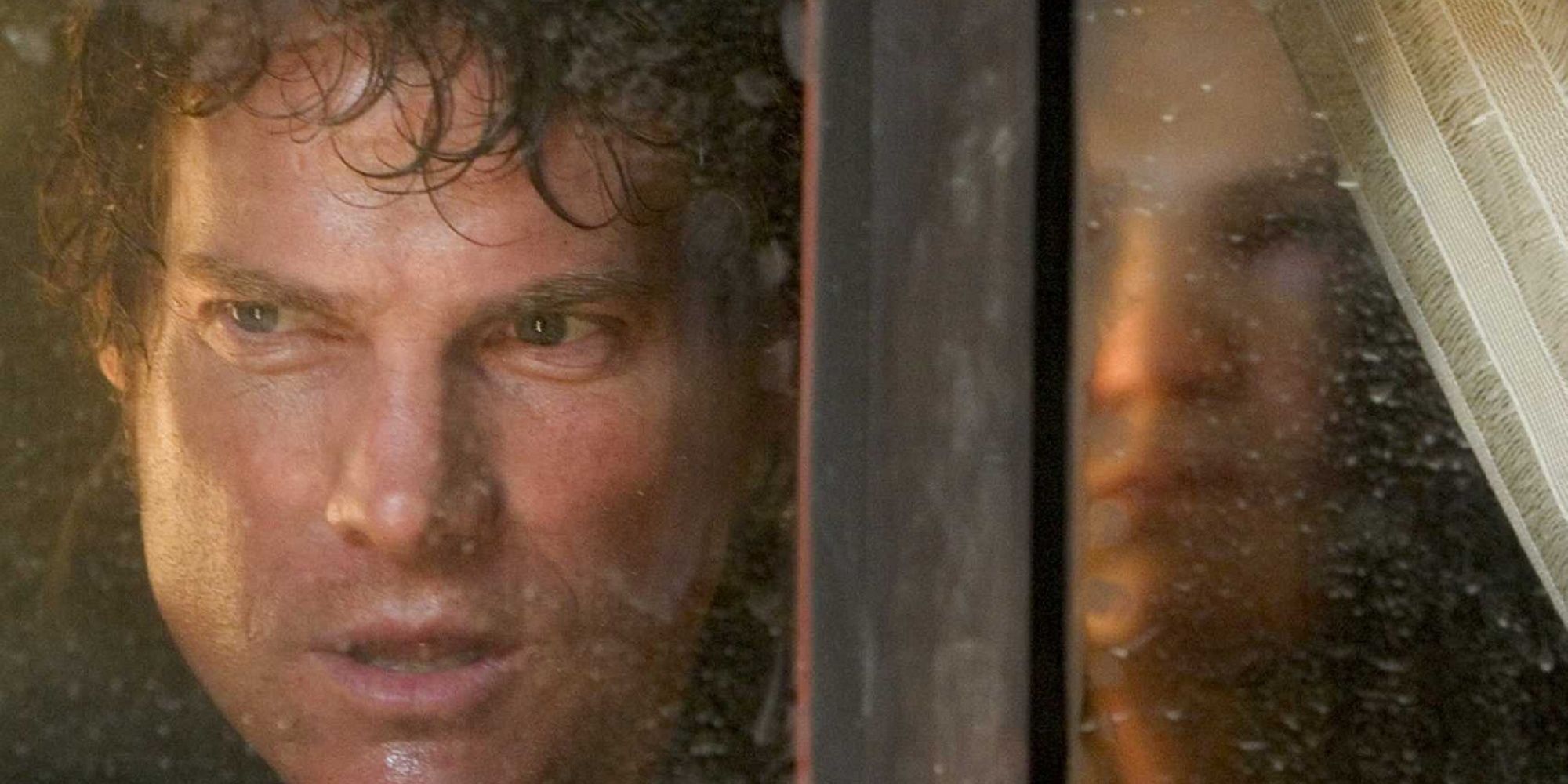 Bo looking out the window in 'House of Wax' with Vincent behind him, barely visible.