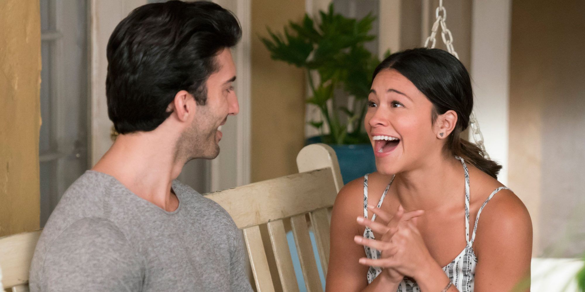 Jane and Rafael from Jane The Virgin smiling and looking at each other