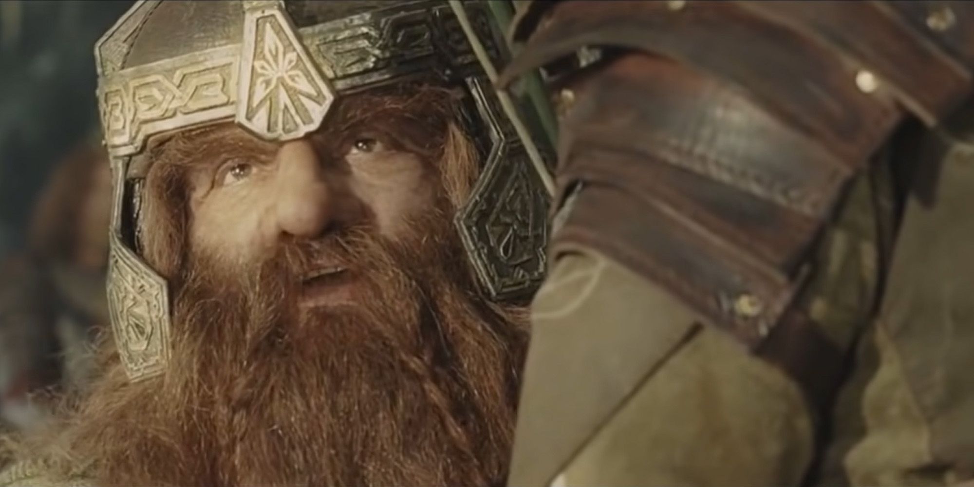 John Rhys-Davies as Gimli at Isengard looking up in The Lord of the Rings: The Two Towers