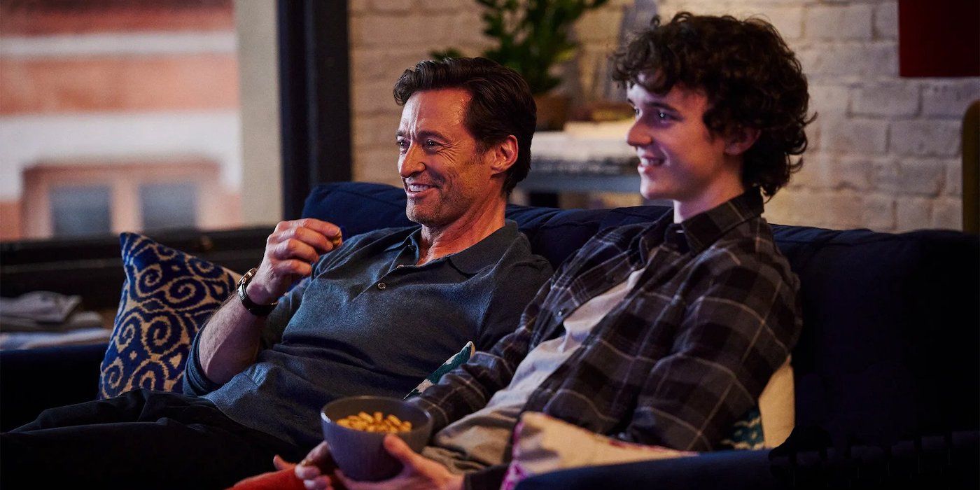 Peter and Nicholas sitting on the couch and laughing in The Son.