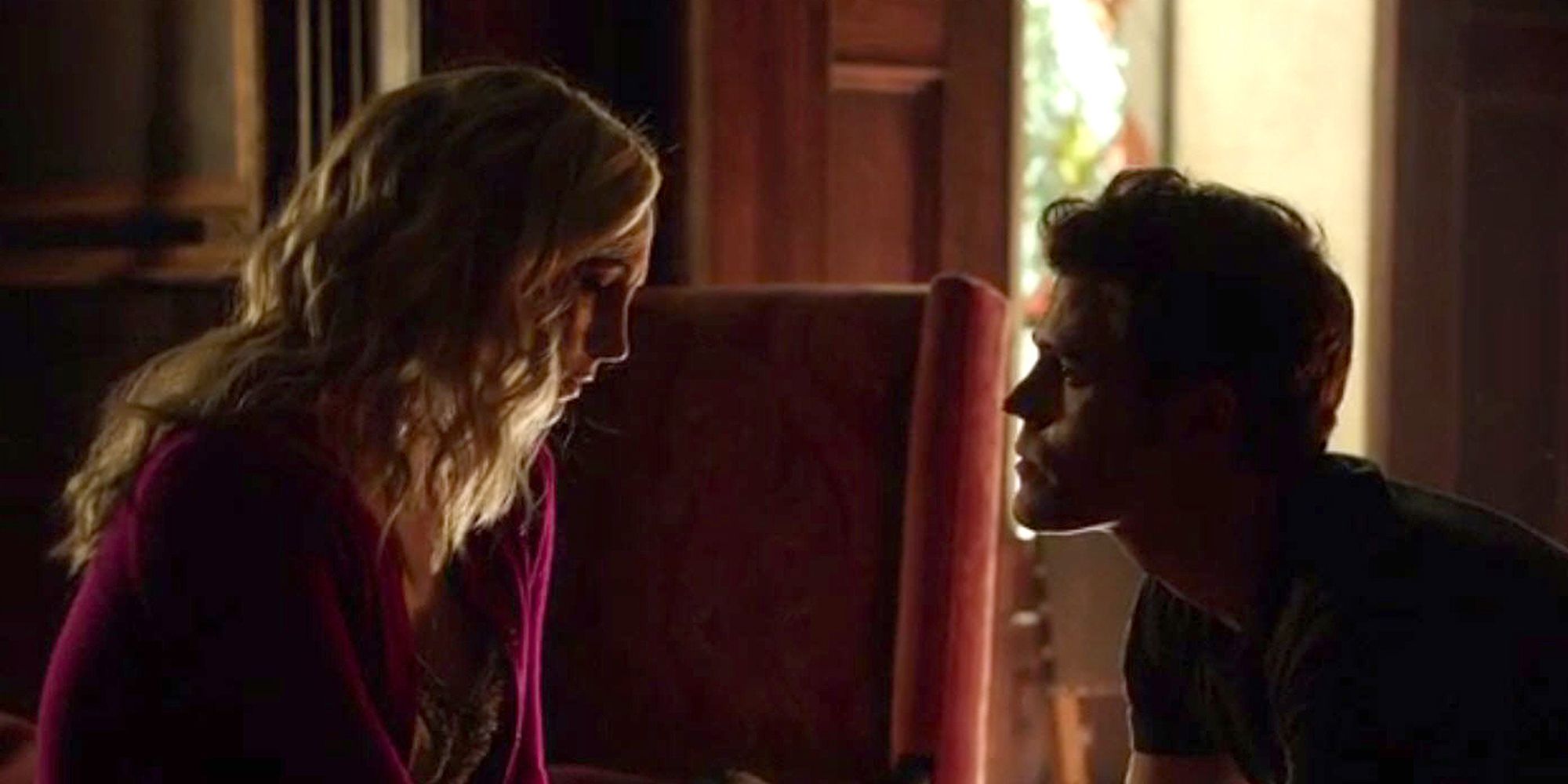Stefan and Caroline from The Vampire Diaries staring at each other
