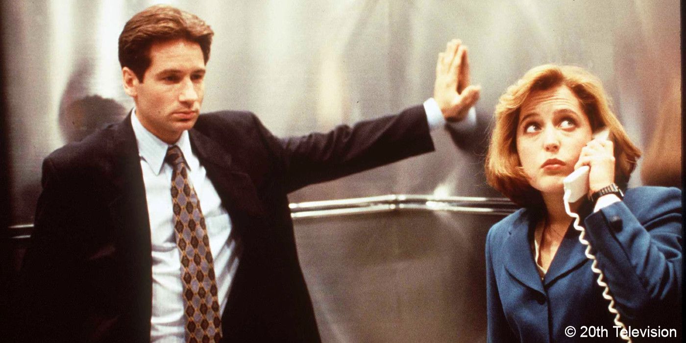 The X-Files_Mulder and Scully stand in an elevator