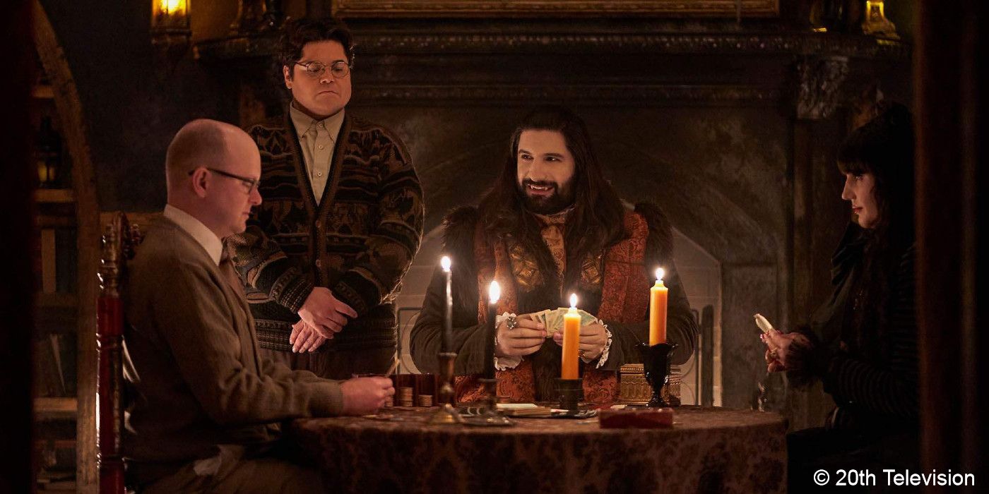 What We Do In the Shadows_Craig Guillermo Nandor and Nadja sit around a table