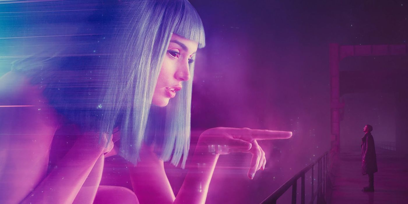 A massive Joi hologram pointing towards "K" in 'Blade Runner 2049'