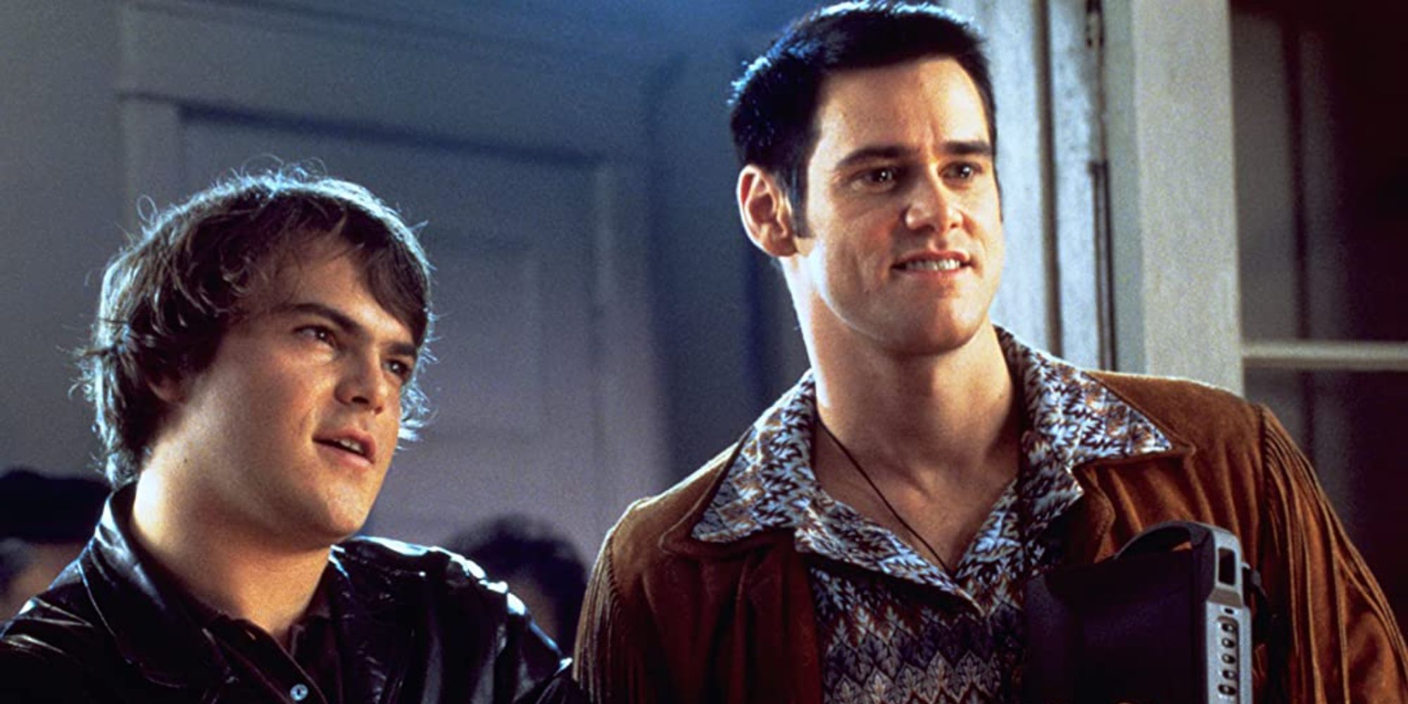 Rick and The Cable Guy smiling confidently in The Cable Guy