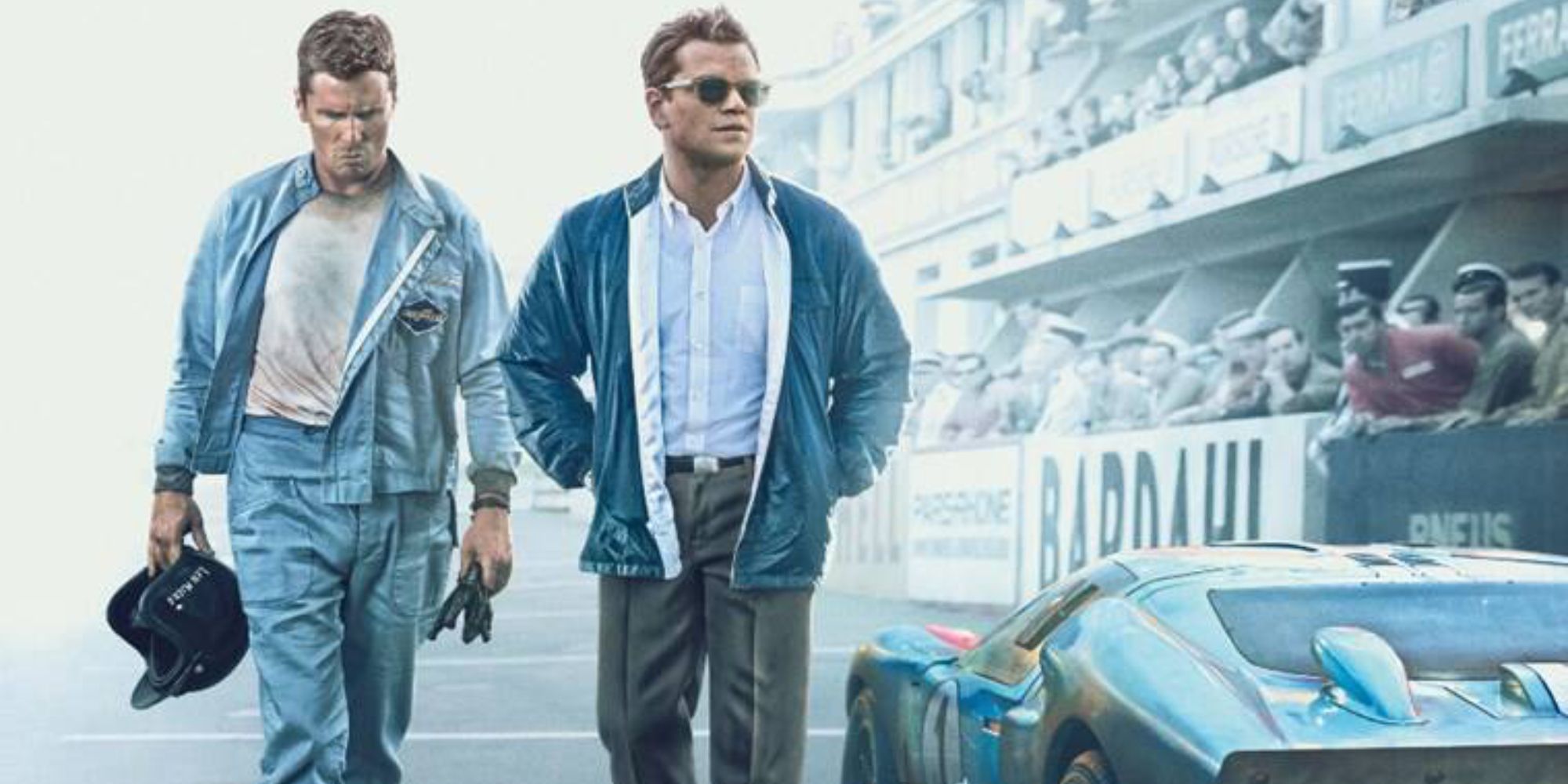 Christian Bale and Matt Damon stand on a racetrack for Ford v Ferrari poster.