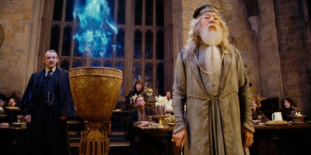 Dumbledore and Barty Crouch Sr. standing by the Goblet of Fire