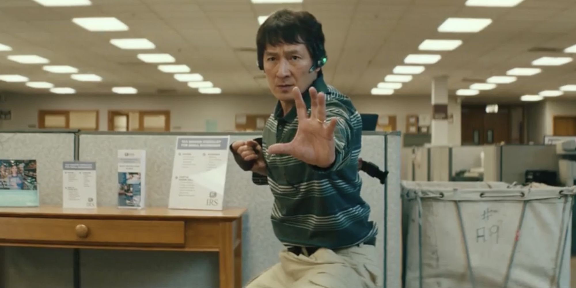 Ke Huy Quan as Alpha-Waymond, standing in a fighting pose in Everything Everywhere All At Once.