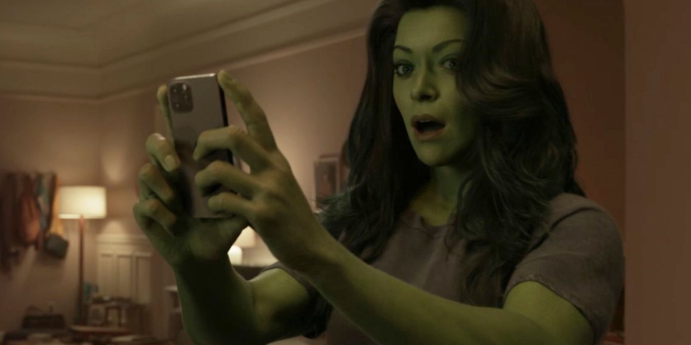 She-Hulk holding a phone and looking at the camera