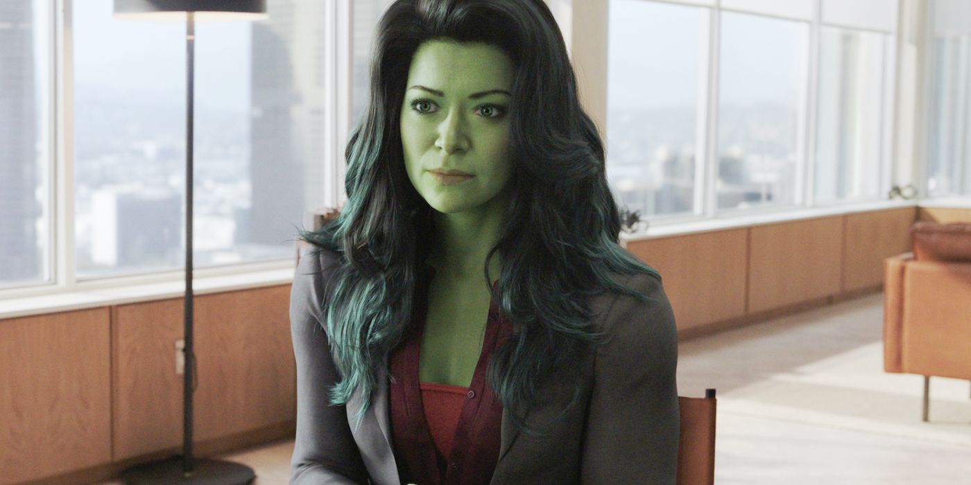 Tatianna Maslany in her hulk form sitting in an office in She-Hulk: Attorney at Law