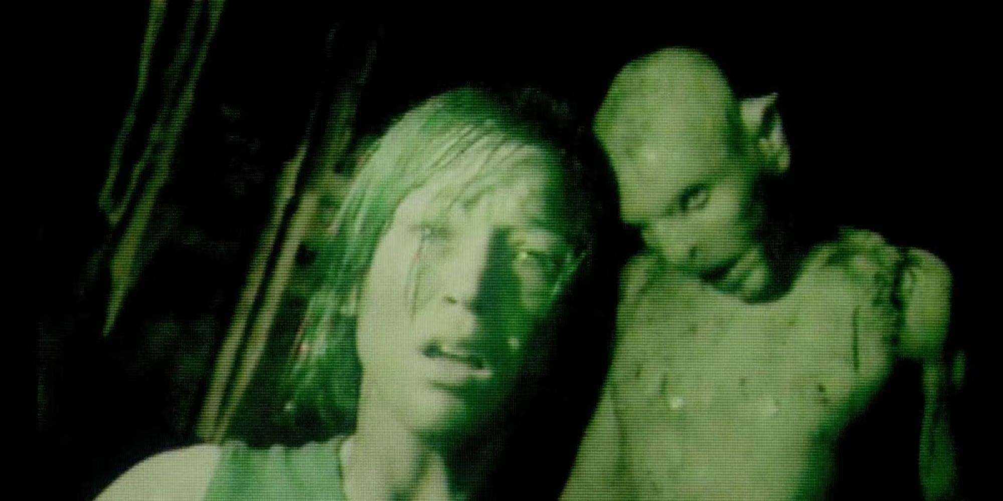 A crawler behind a woman in night-vision