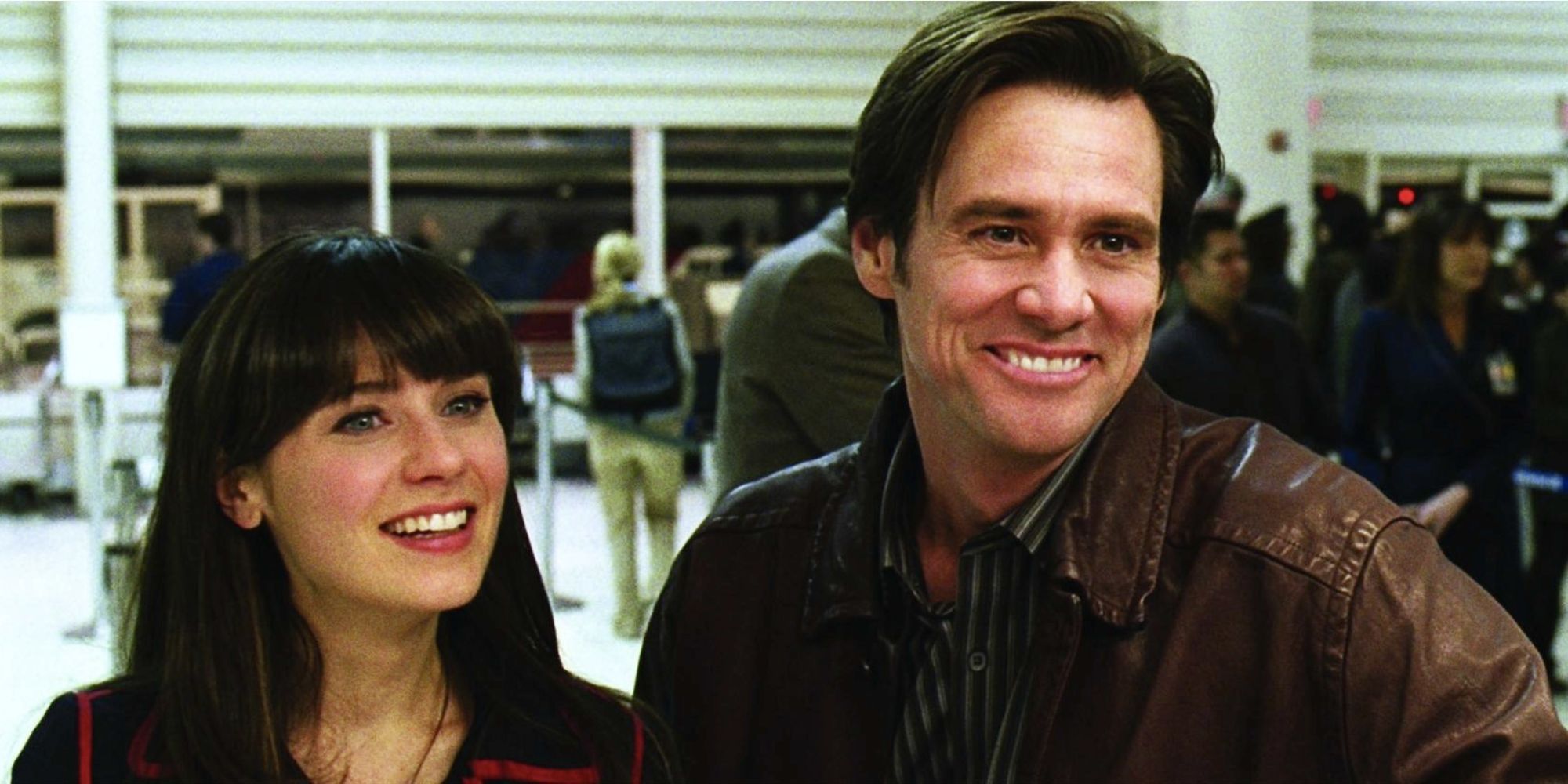 Carl and Allison smiling widely in Yes Man