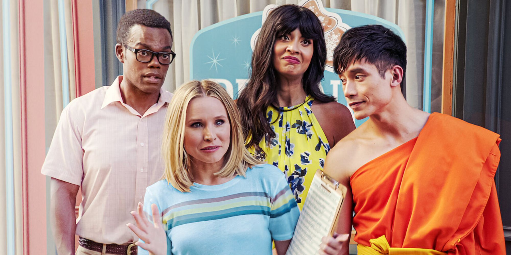 Chidi, Eleanor, Tahani, and Jason from The Good Place standing together