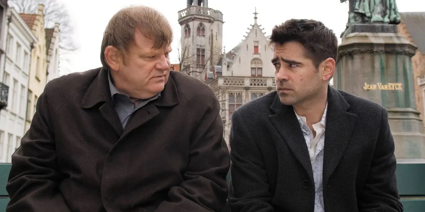 Brendan Gleeson and Colin Farrell as Ray and Ken talking while sitting on a bench in In Bruges.