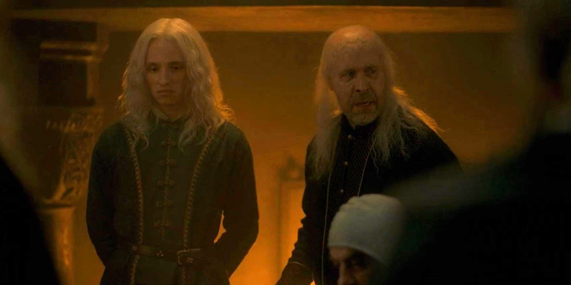 a man looks angry next to an upset youngster