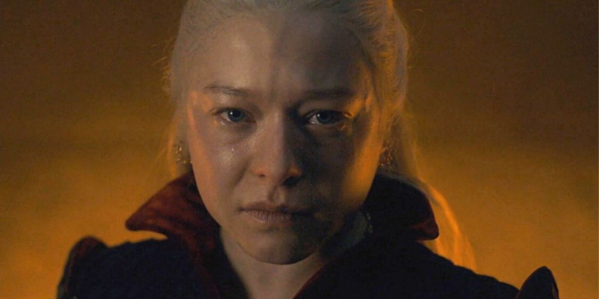 a woman stares at the camera