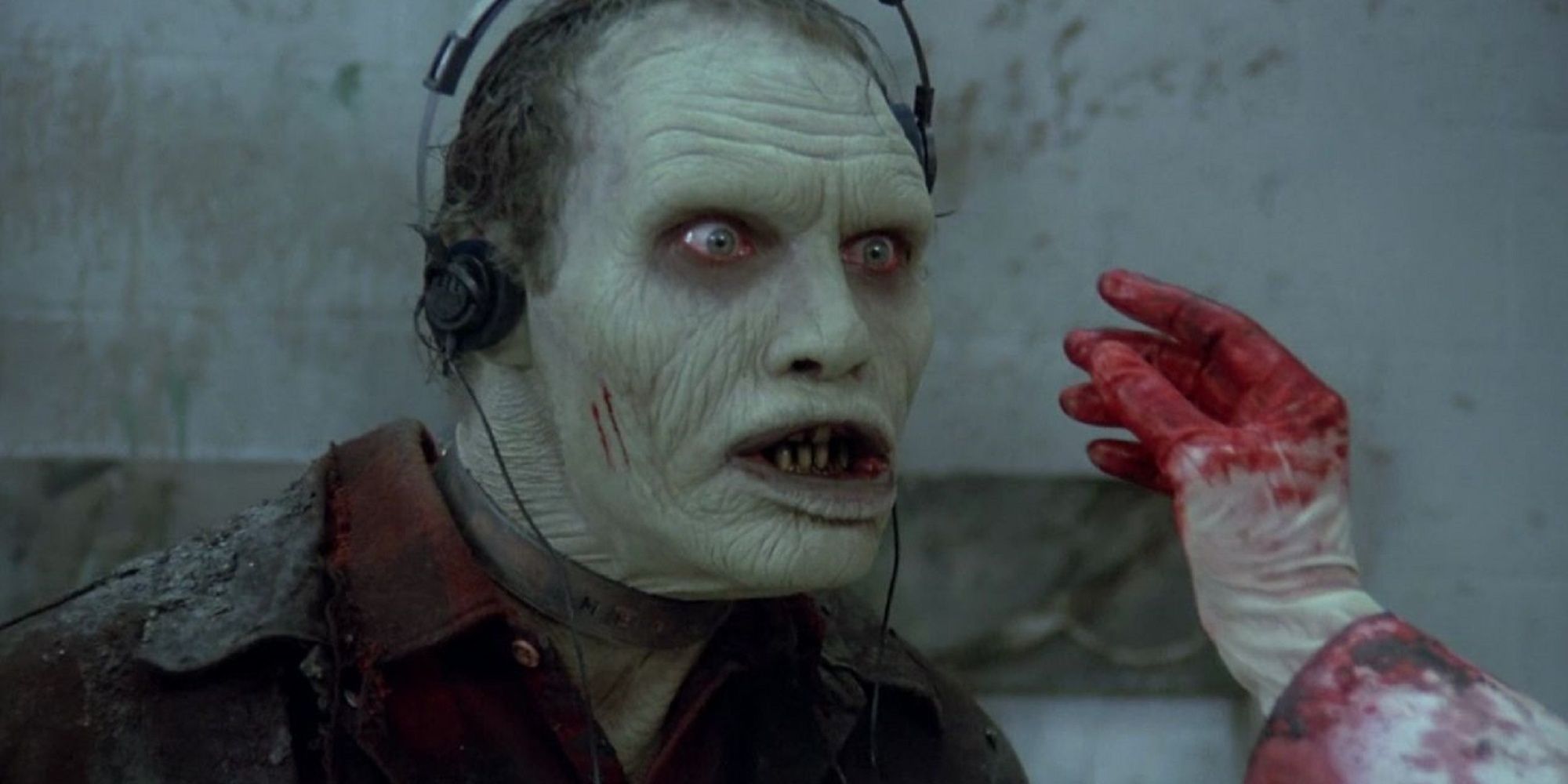 Zombie wearing headphones in 'Day of the Dead.'