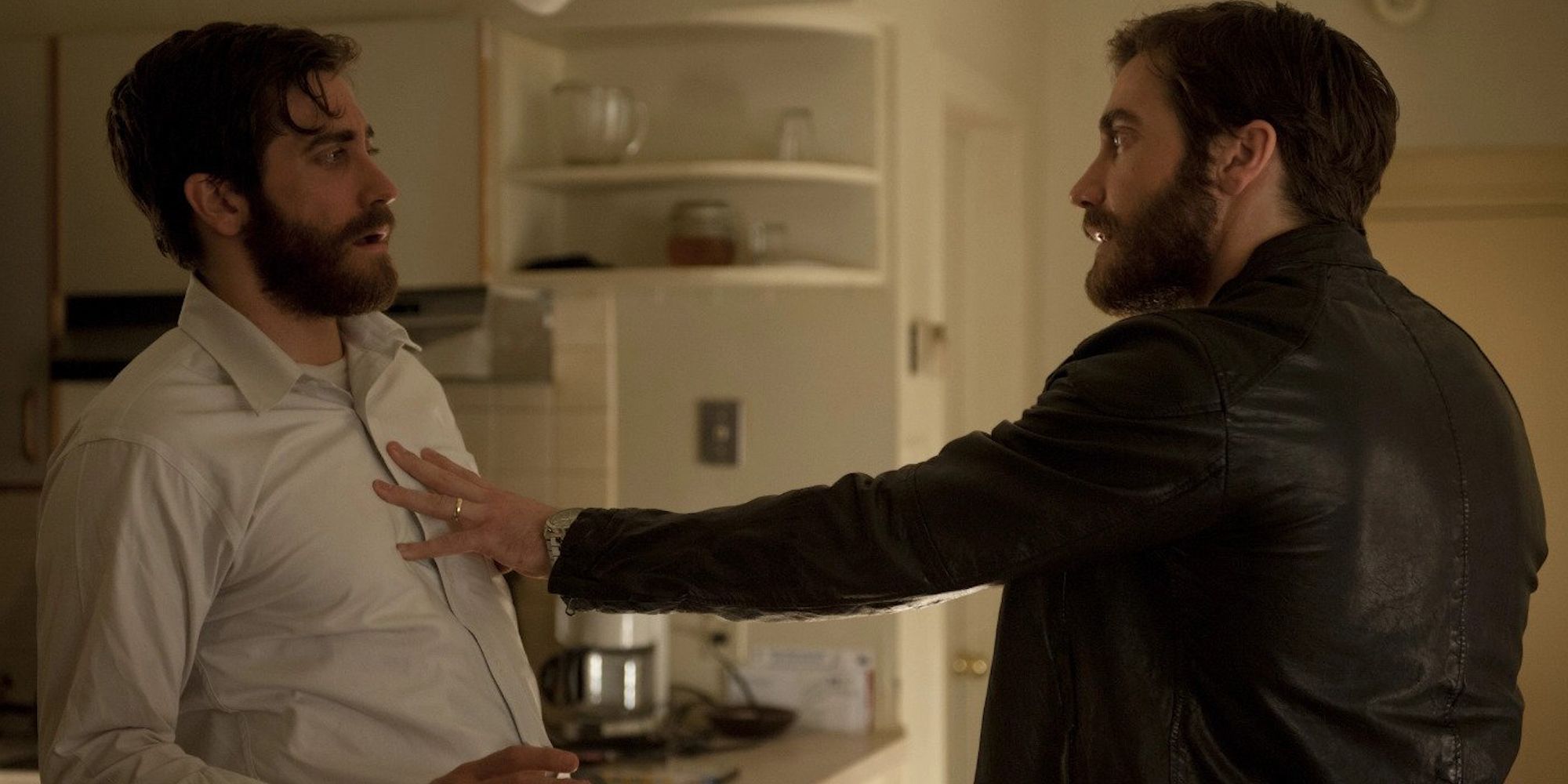 Jake Gyllenhaal as Adam confronting Jake Gyllenhaal as Anthony in 'Enemy'