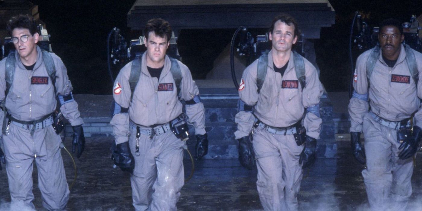 The Ghostbusters look serious while wearing their proton packs in 'Ghostbusters'.