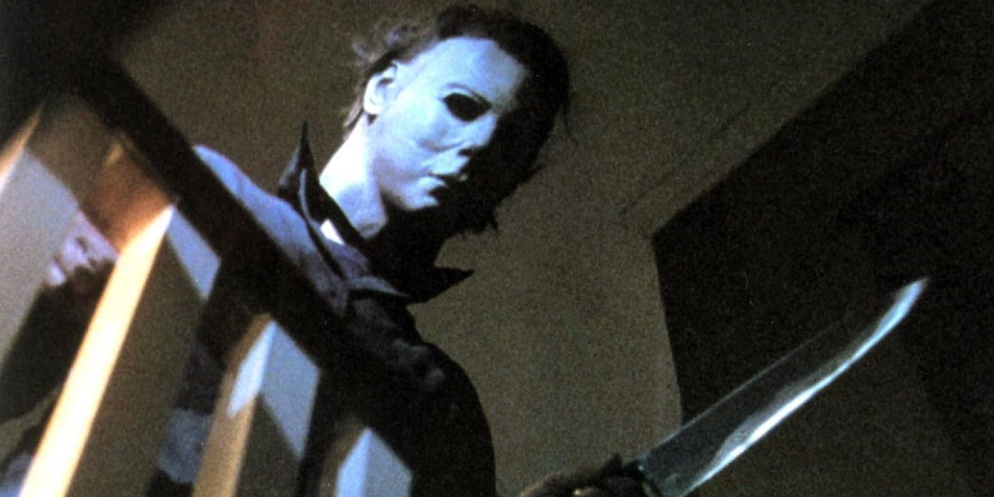 Michael Myers with his butcher's knife at the top of the stairs in 'Halloween.'