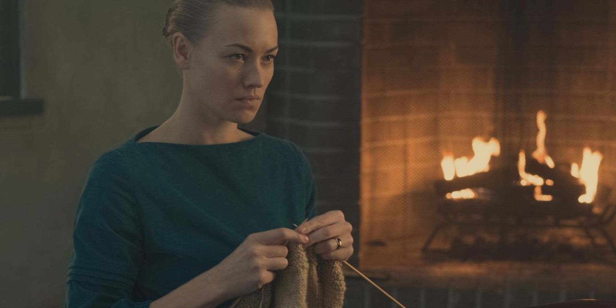 Serena knitting by the fire