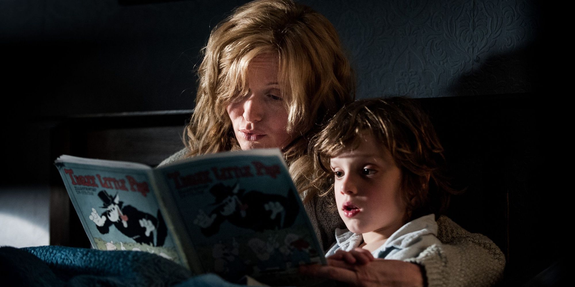 Essie Davis as Amelia reads to her son in The Babadook