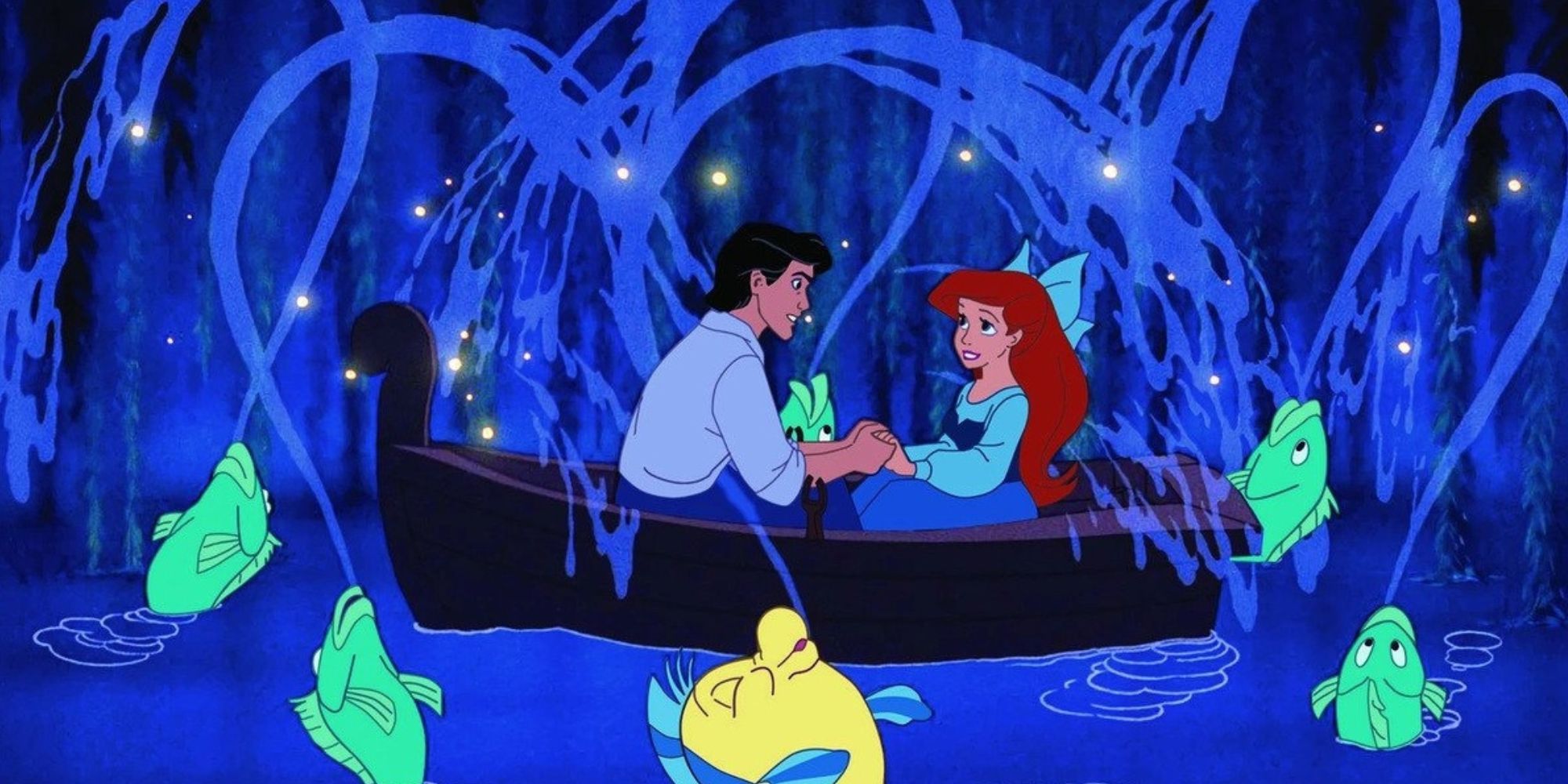 Ariel and Eric holding hands in a boat