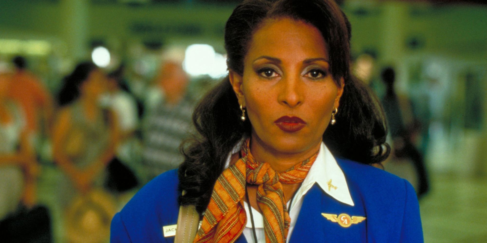 A flight attendant woman walking