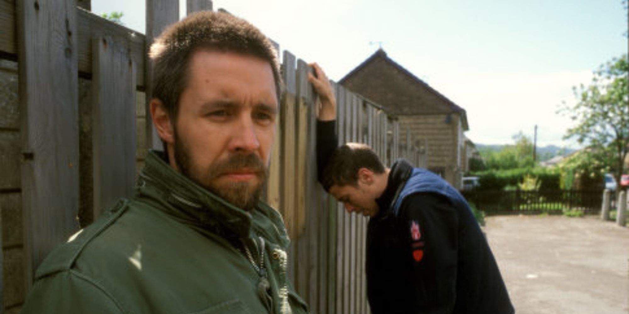 Paddy Considine as Richard and Toby Kebbell as Anthony leaning on a fence Dead Man&rsquo;s Shoes