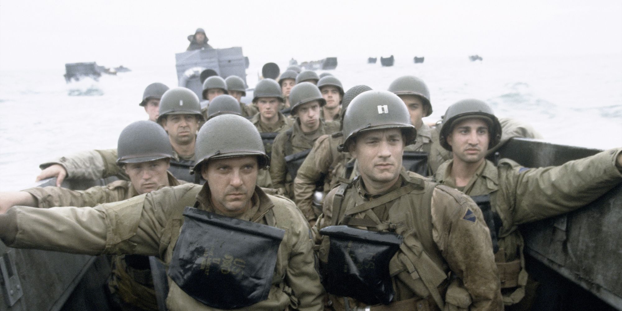 Tom Hanks as Captain Miller in Saving Private Ryan in a boat with his troops approaching the beach.