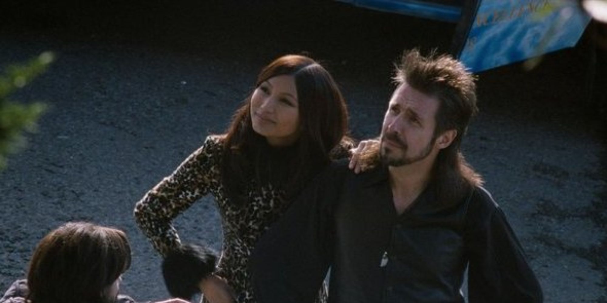 A couple standing on the street