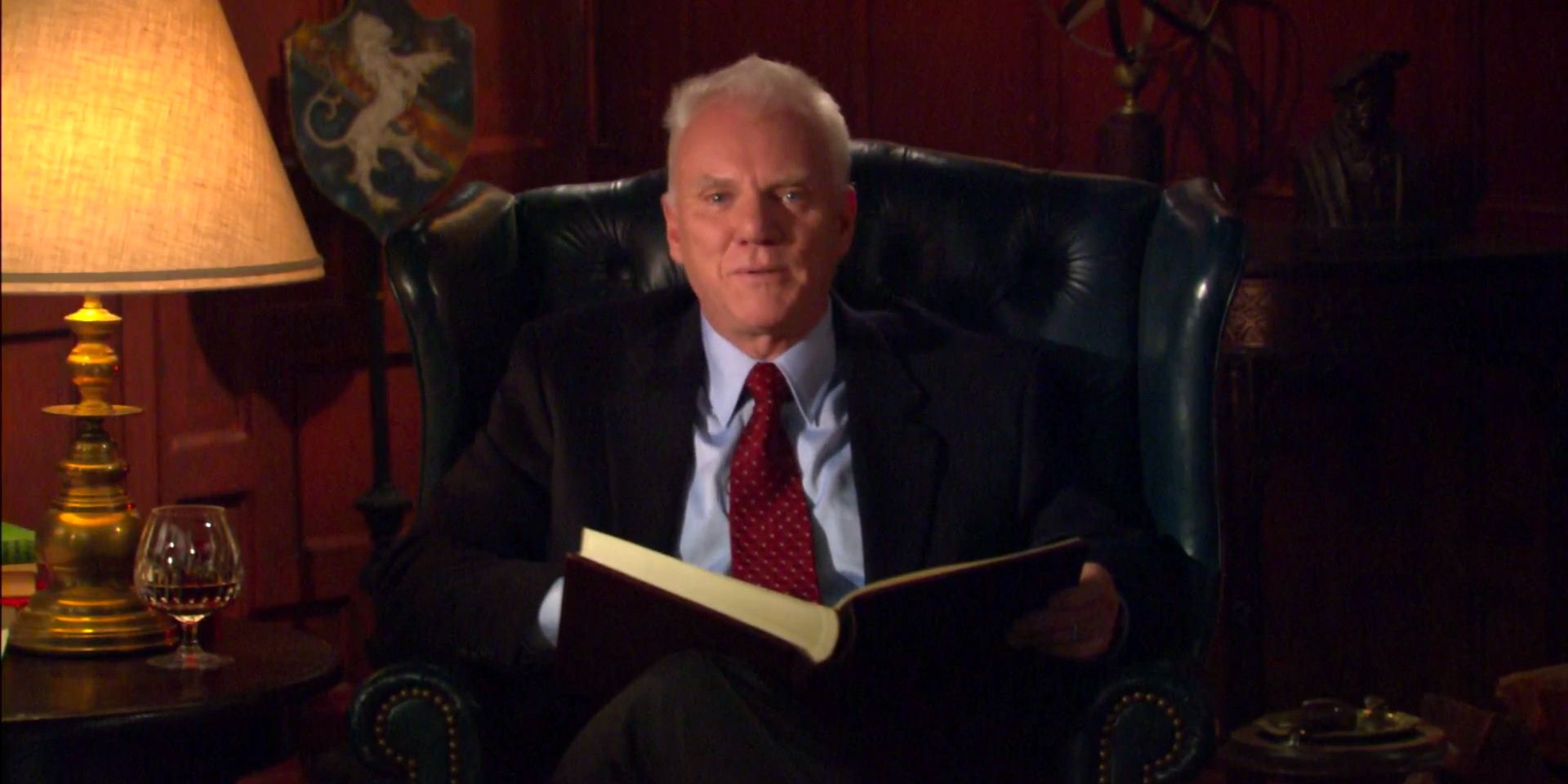 Malcolm McDowell sits in a chair as he narrates an episode of 'South Park'