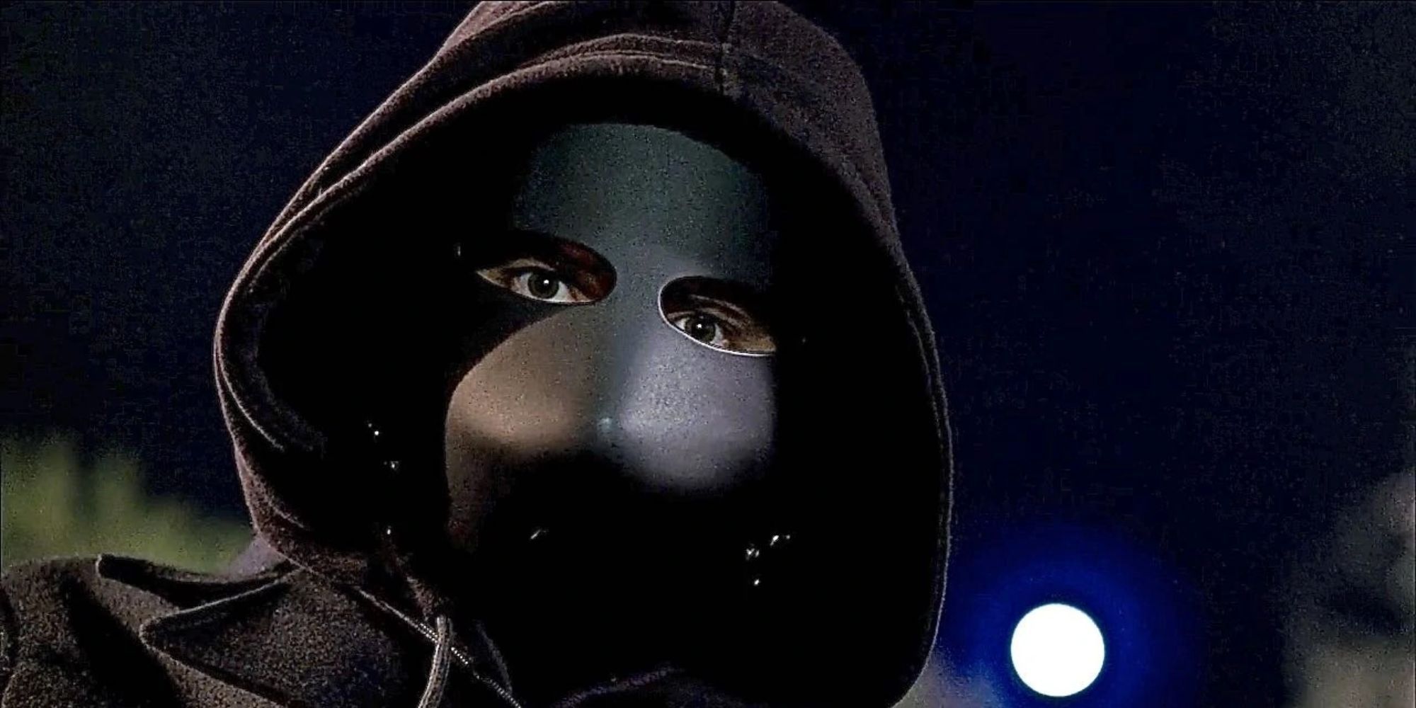 a man in a black mask