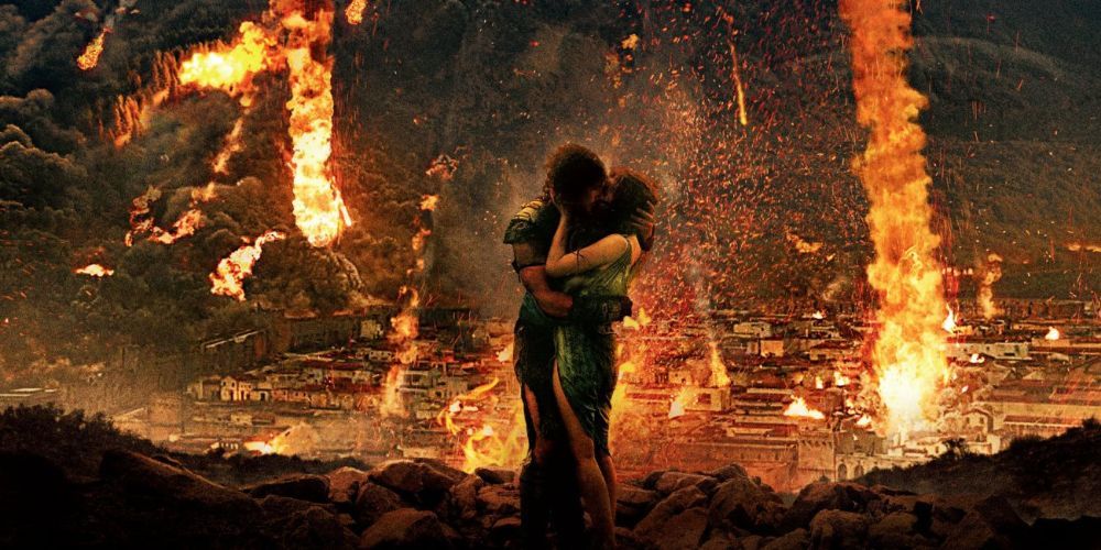 Milo and Cassia embrace as Pompeii is destroyed in Pompeii