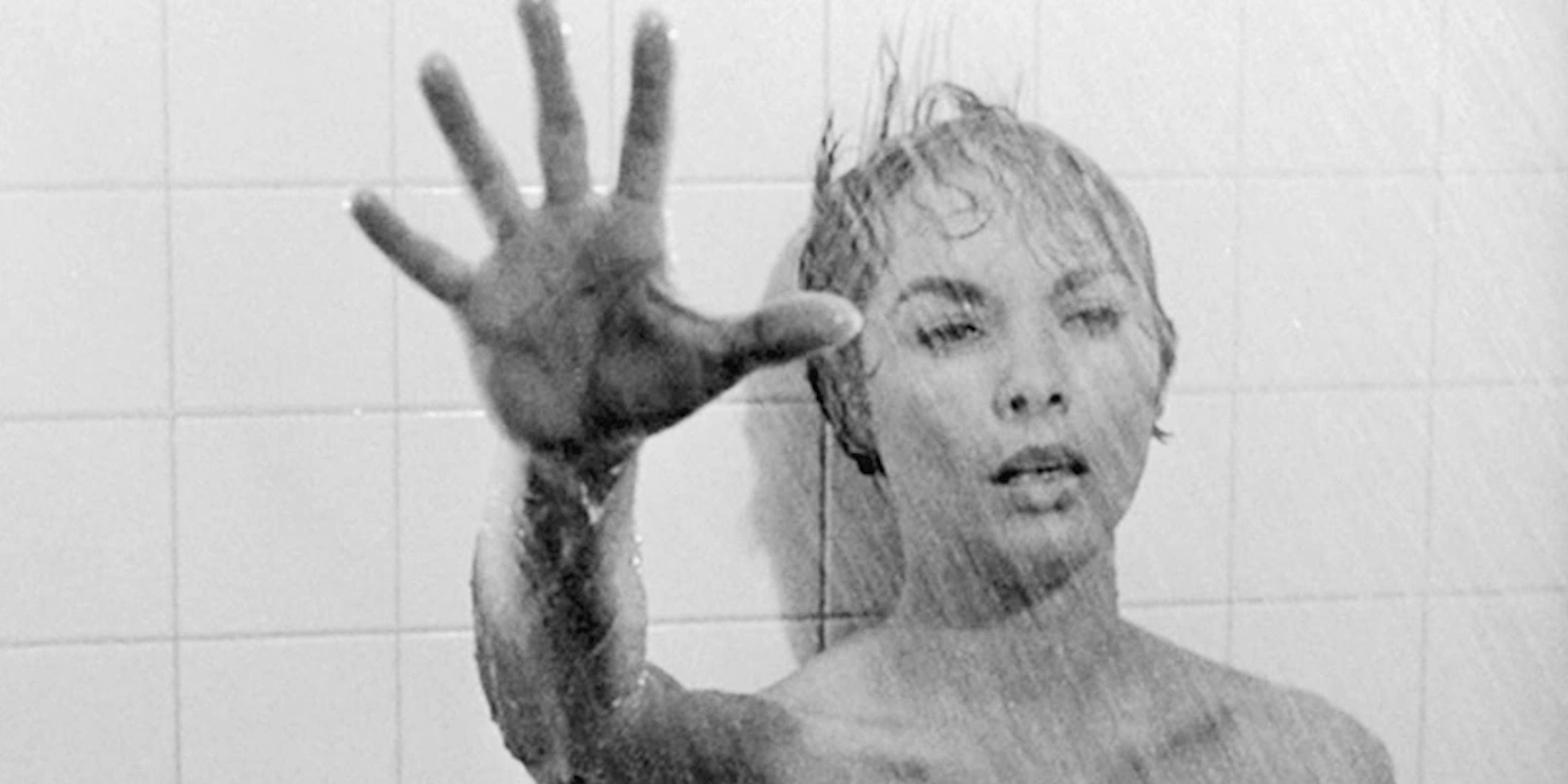 Janet Leigh as Marion Crane reaching out while collapsing in the shower in Psycho